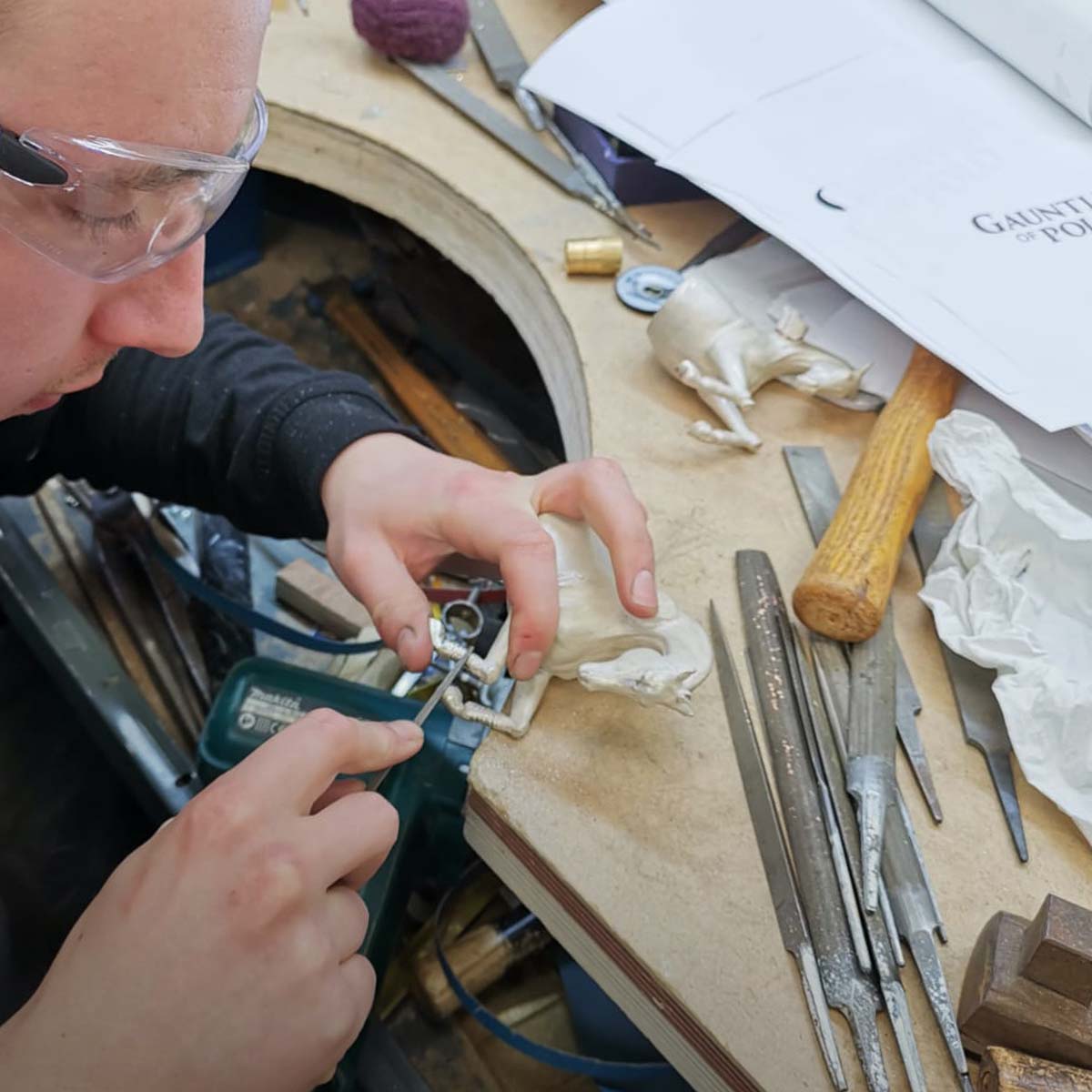 Silversmiths at work on the prestigious Gauntlet of Polo Trophy