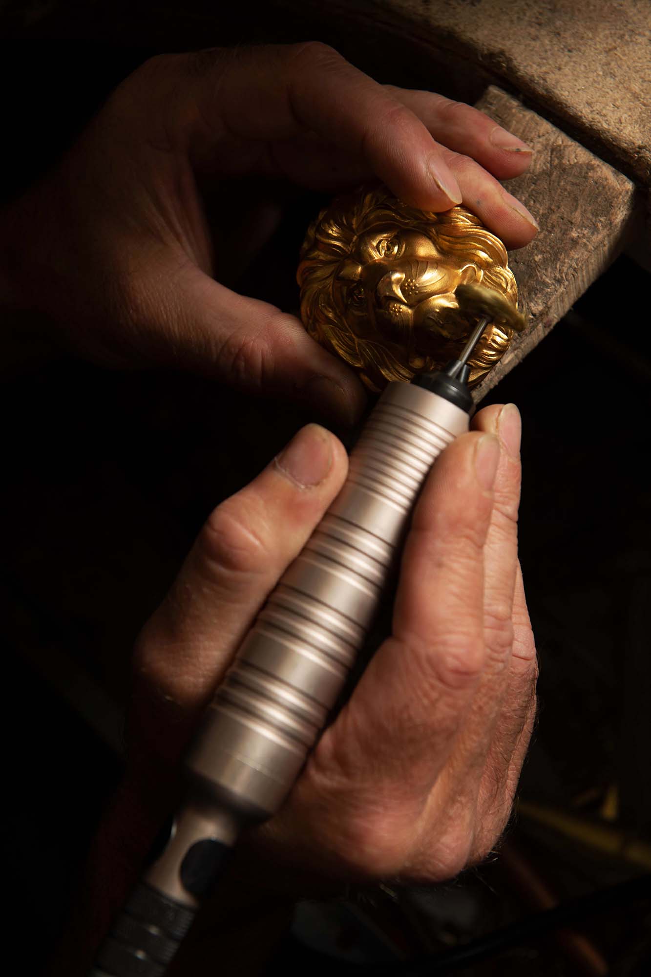 silversmith restoring queens guard helmet