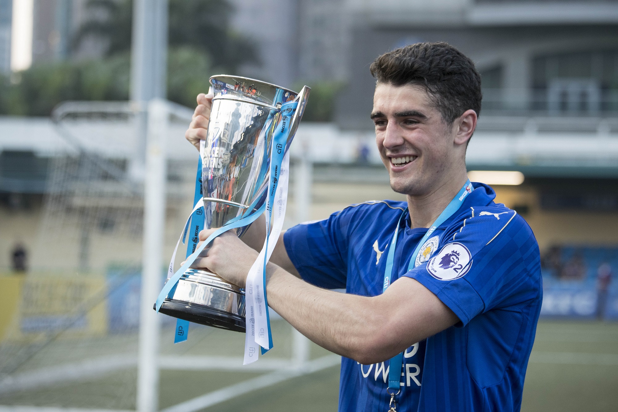 silver trophy with ribbons and engraving soccer sevens