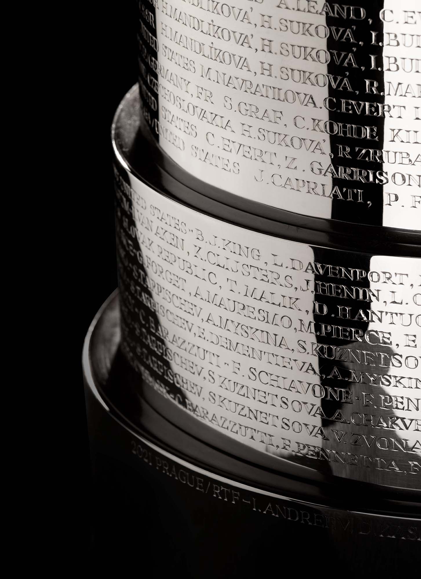 Names of winning team members of the Billie Jean King Cup engraved on to the trophy plinth