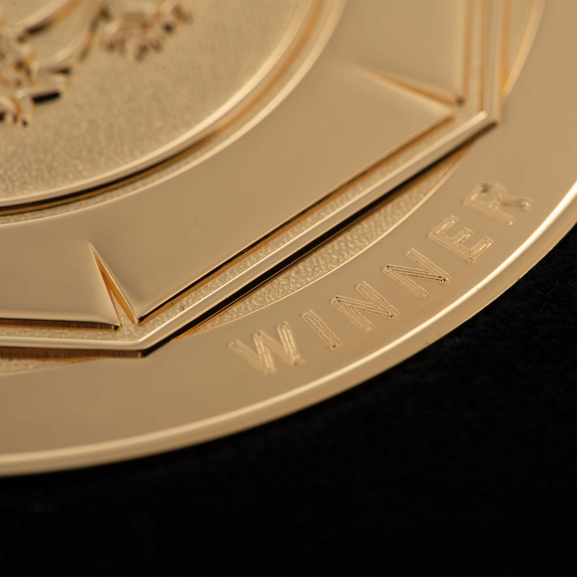 Close-up of gold-plated FA Community Shield winners medal Designed and made by Thomas Lyte