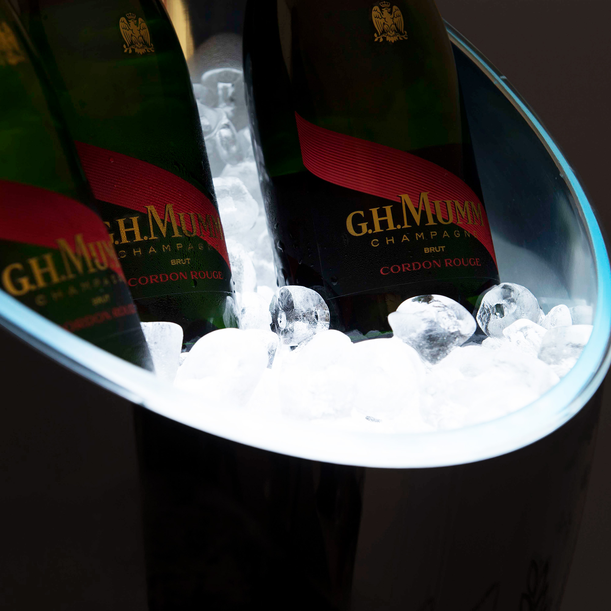 Ice inside bespoke silver champagne cooler for G H Mumm Champagne