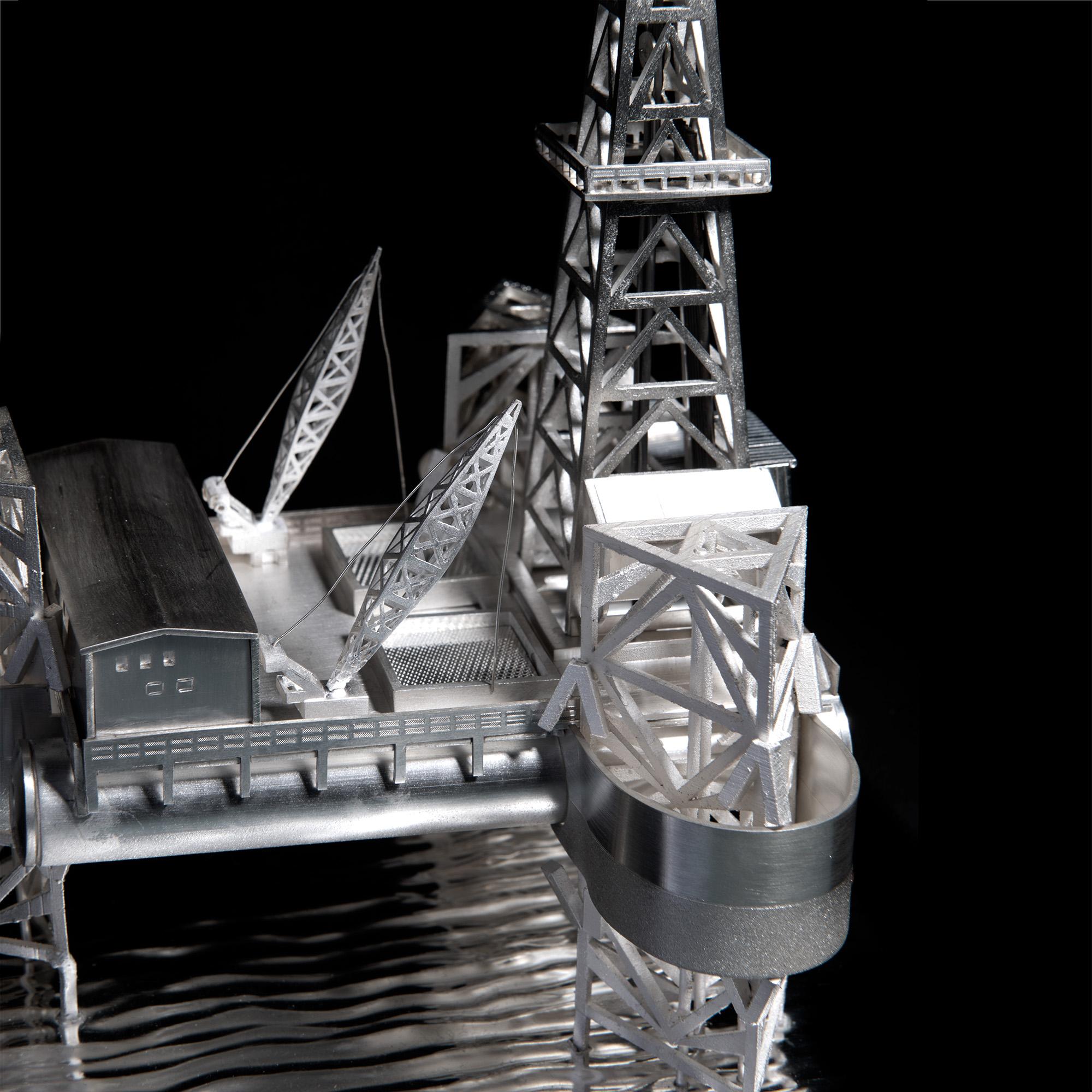 Master silversmiths make silver oil rig model gift for a US President