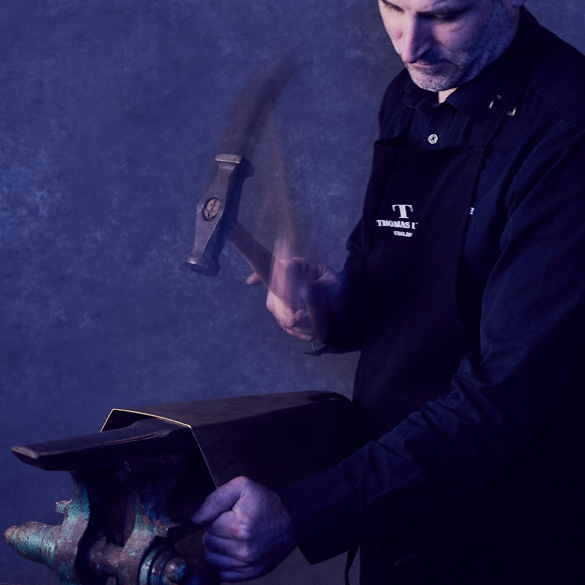 silversmith-hammering-closeup-square