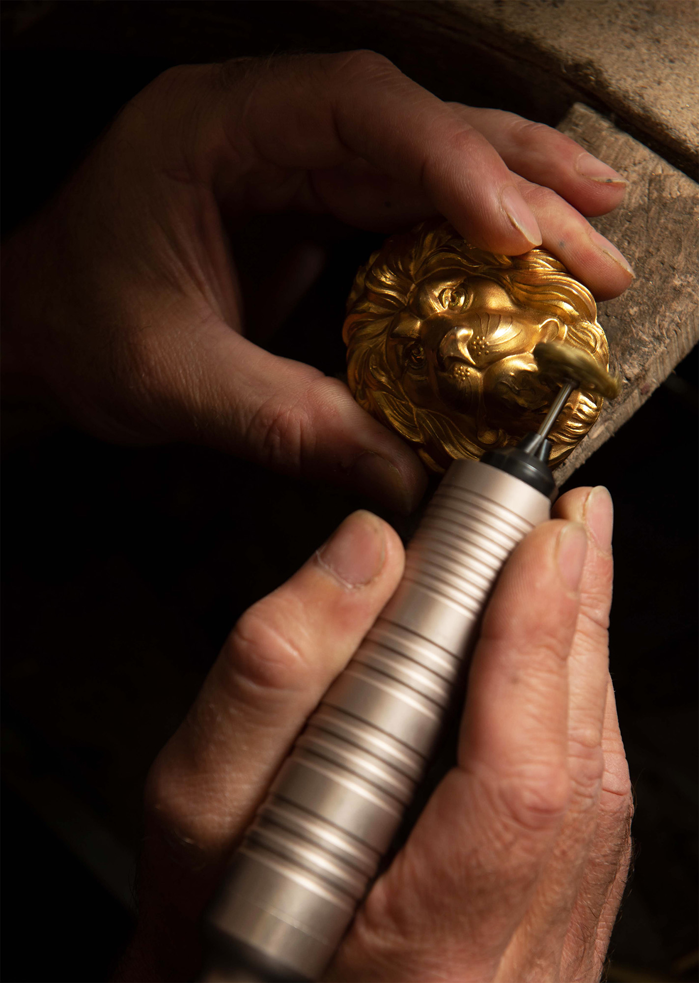 silversmith repairs royal military helmet decoration