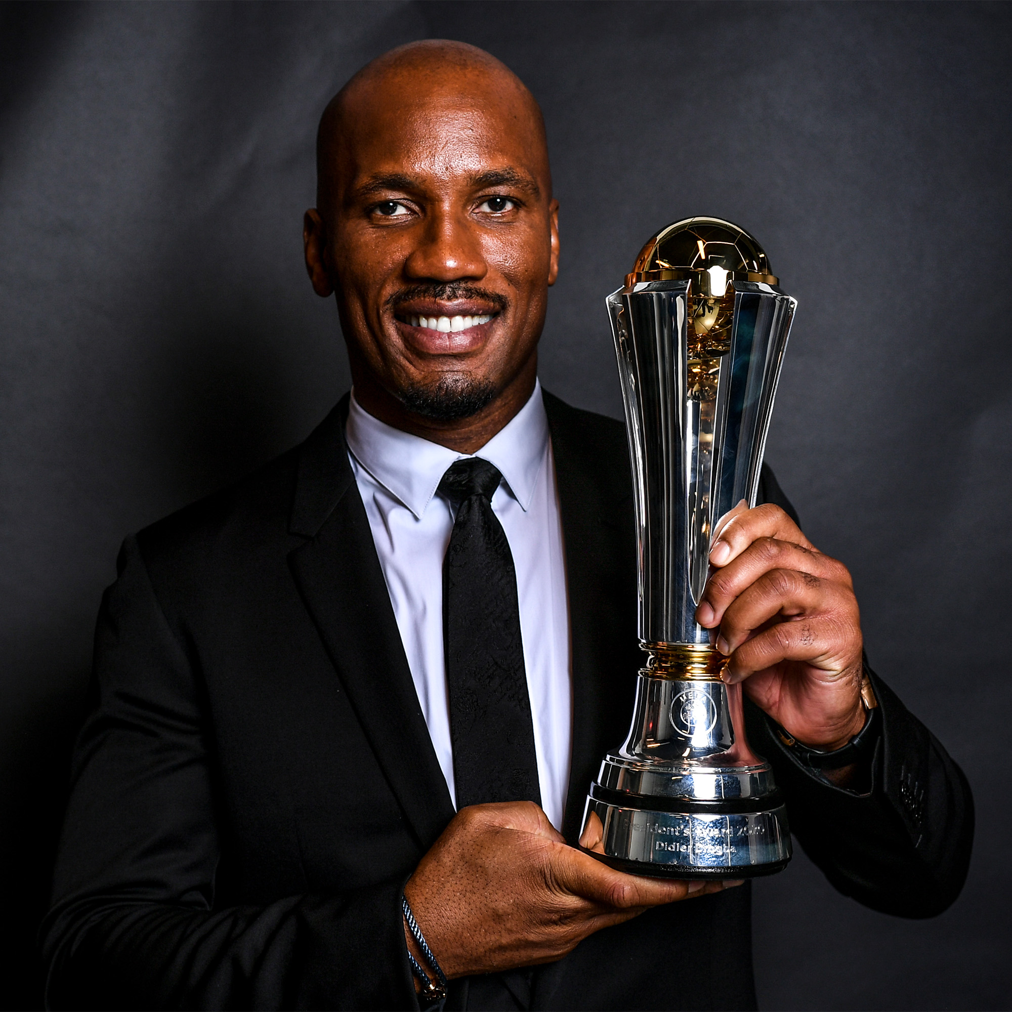 Didier Drogba receives the UEFA Presidents Award made by thomas Lyte