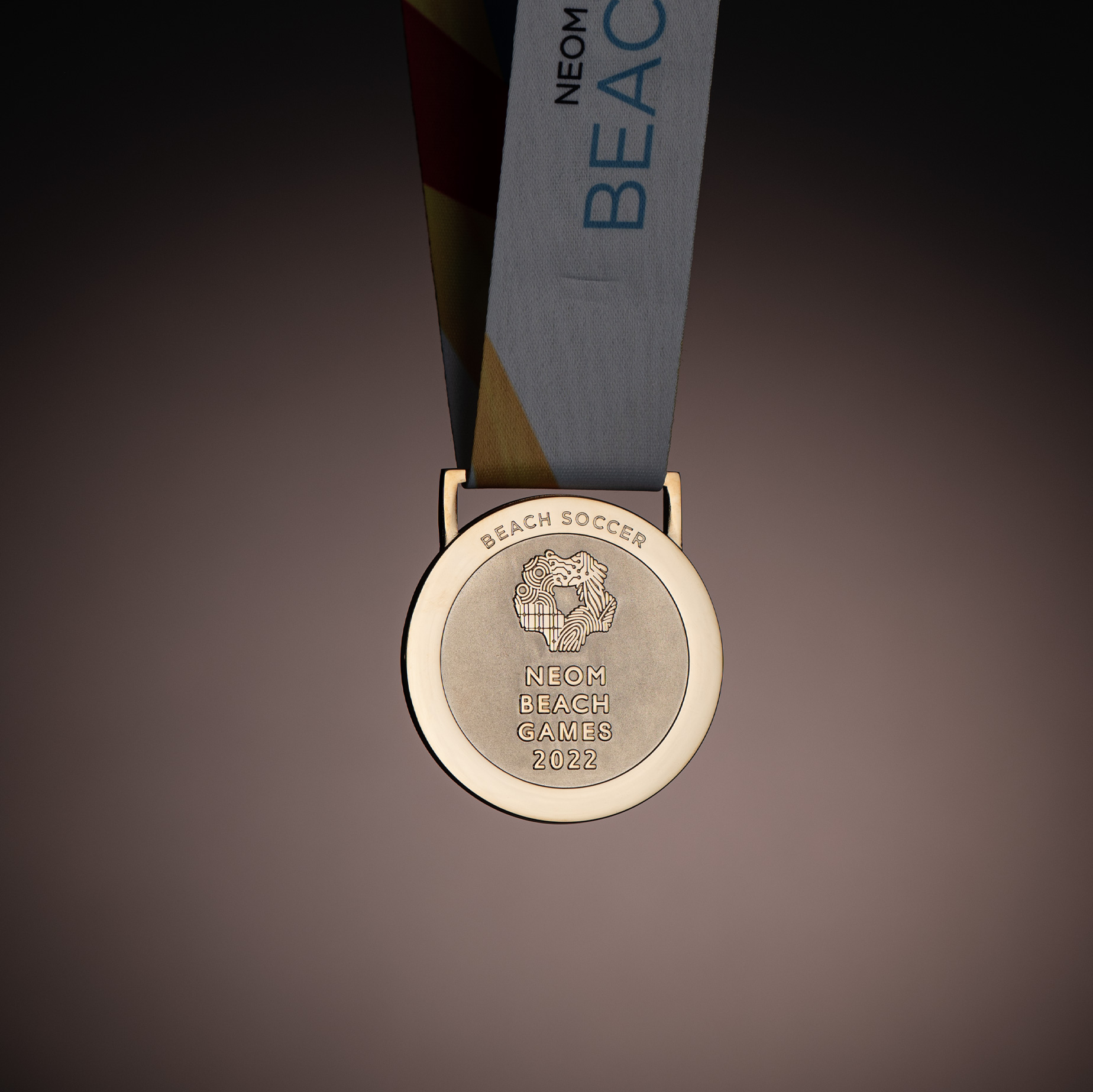 Makers and designers of the Neom Beach Soccer Medals Gold