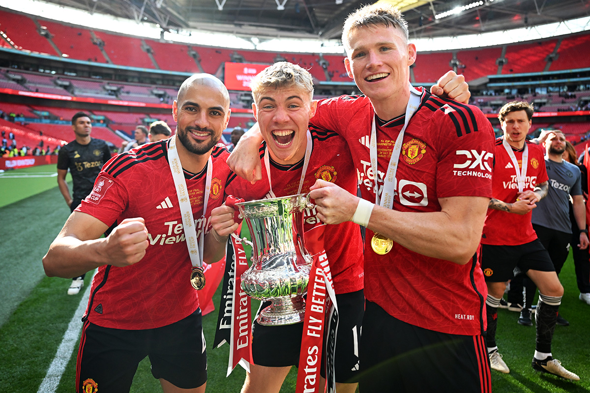 amrabat hojlund and mctominay with the fa cup trophy handcrafted by Thomas Lyte