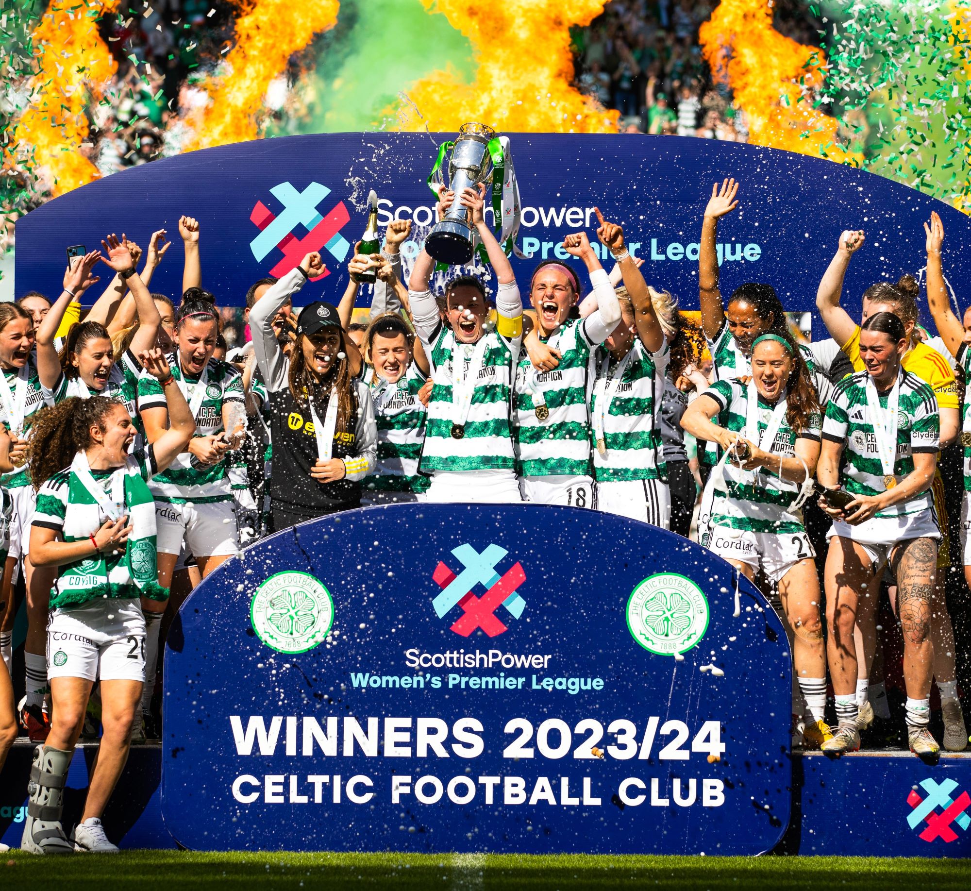 Champions Celtic lift the SWPL trophy designed and made by Thomas Lyte flame
