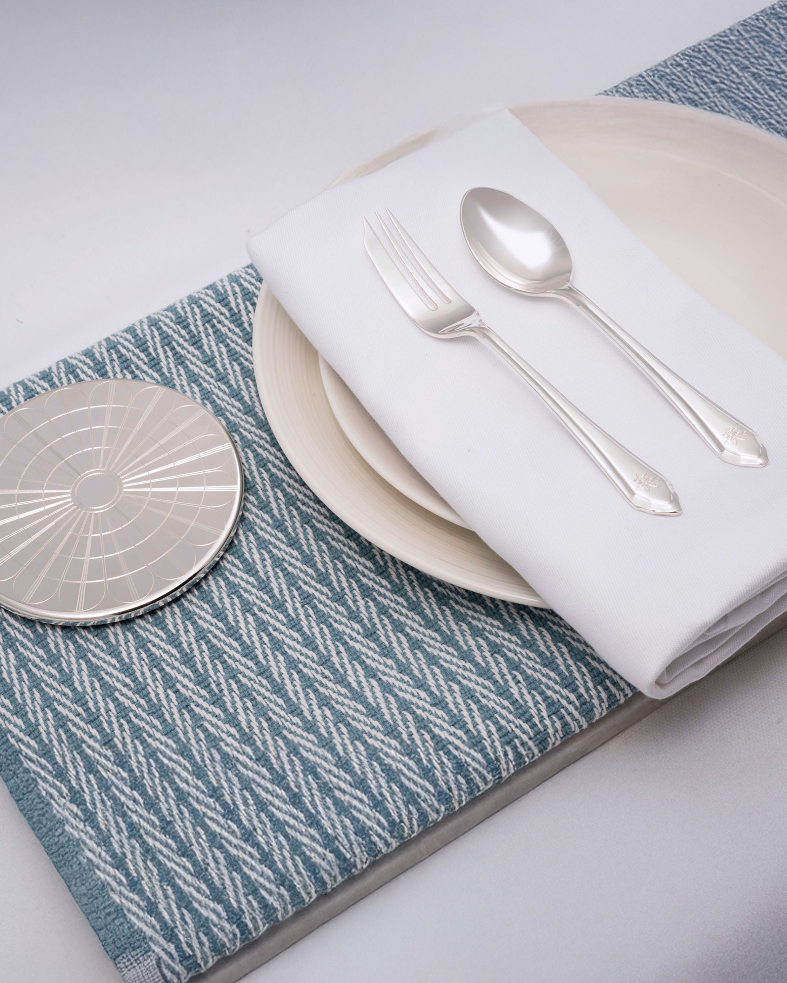 silver coaster cake fork and spoon made by Thomas Lyte Little Venice Cake Company portrait
