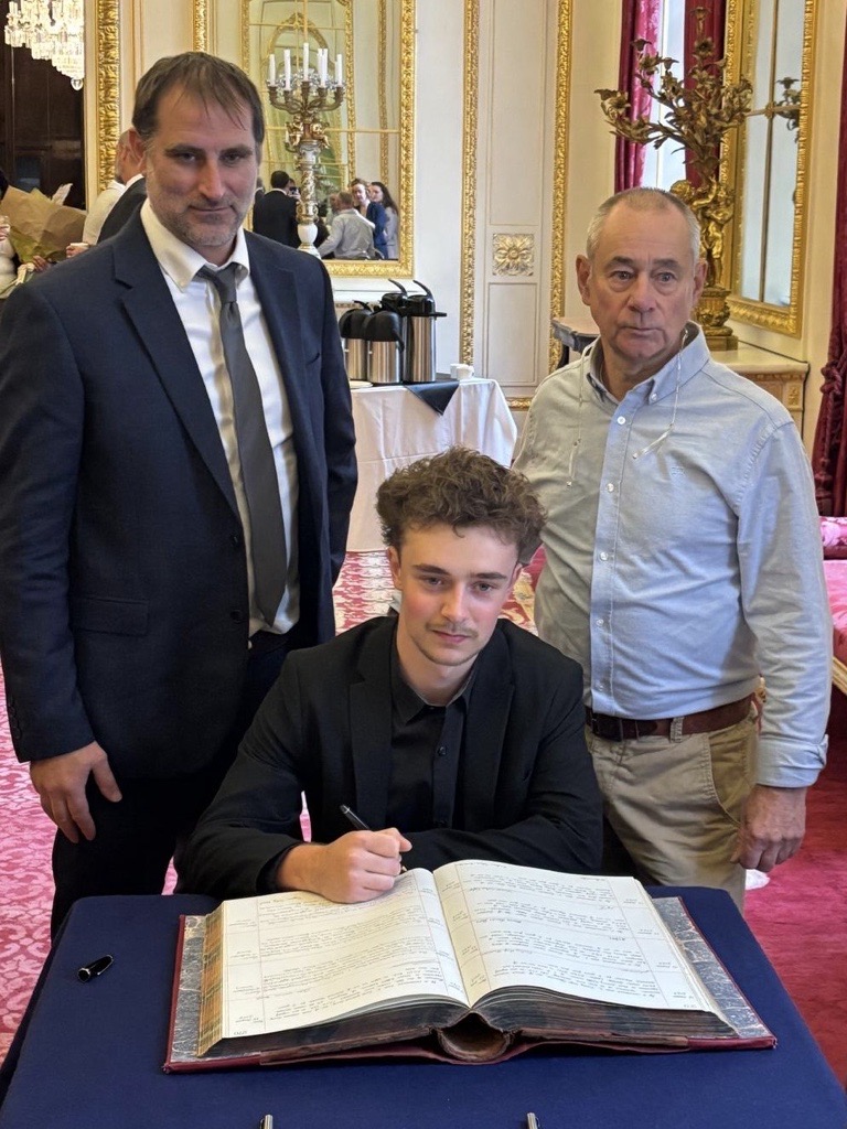 Thomas Lyte apprentice Tigern Hunt signs his apprenticeship at Goldsmiths hall